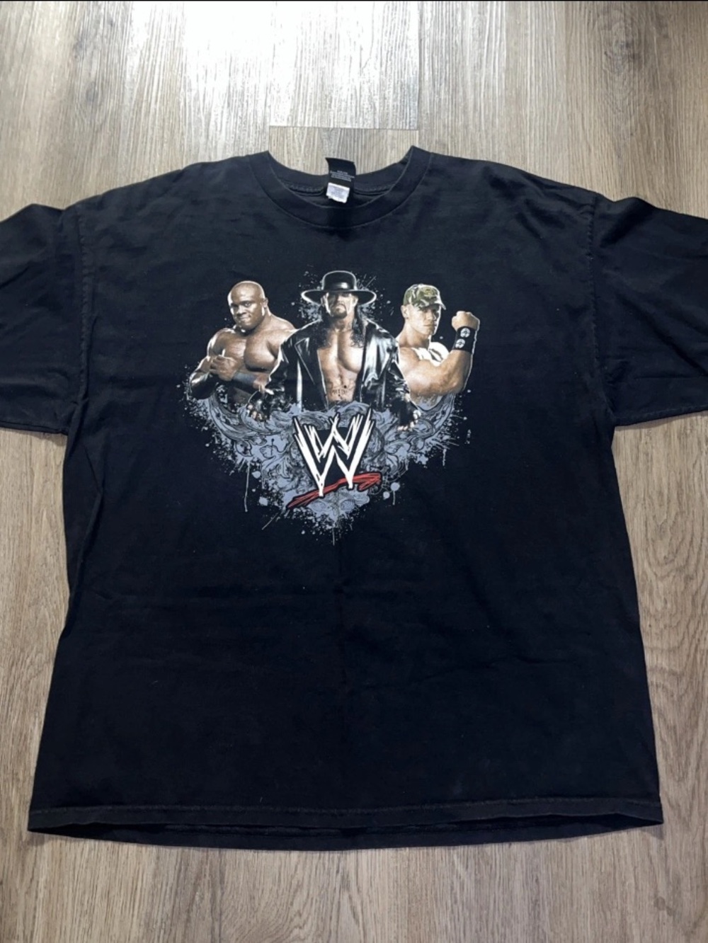 vintage WWE Black Short Sleeve Tee with Wrestler Graphic undertaker john cena